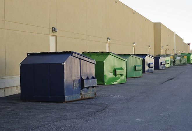 large roll-off dumpsters prepared for construction waste in San Joaquin